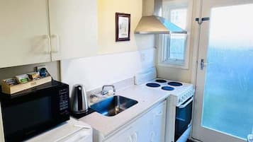 Coffee/tea maker, electric kettle, toaster, dining tables