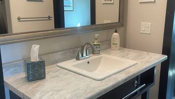 Hair dryer, towels, soap, toilet paper