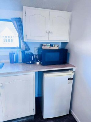 Electric kettle, toaster, dining tables