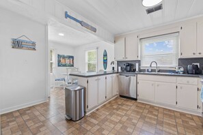 Fridge, microwave, dishwasher, coffee/tea maker