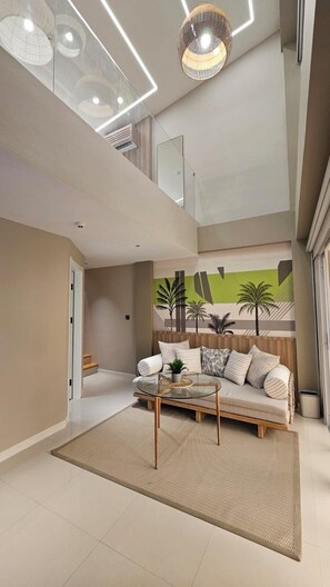 Quarto luxo, 1 cama King | Área de estar