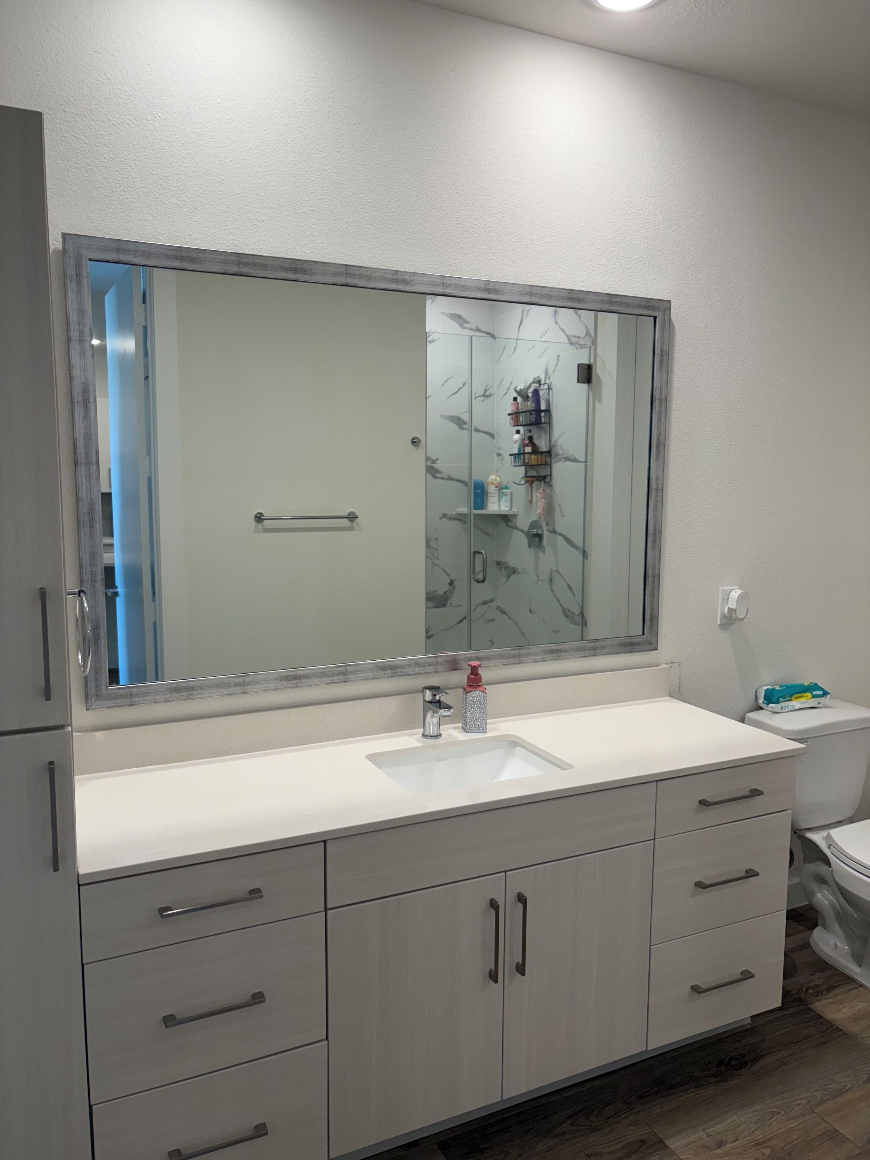 Shower, towels, soap, toilet paper