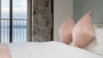 Family Apartment, Ocean View | Blackout drapes, free WiFi, bed sheets