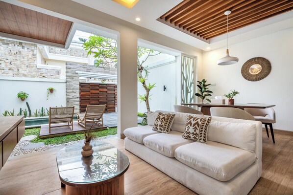 Deluxe Villa, 2 Bedrooms, Balcony, Pool View | Living area | 50-inch Smart TV with digital channels, Netflix, streaming services