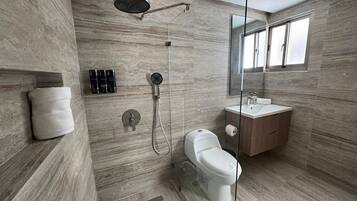 Shower, hair dryer, towels, soap