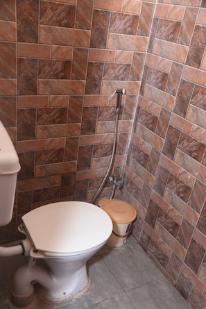 Shower, rainfall showerhead, towels, soap