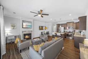 TV, fireplace, books - Stylish Townhome Stay | Near Downtown Spartanburg & Outdoor Paths (Spartanburg)