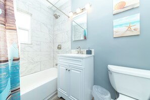 Hair dryer, towels, soap, toilet paper