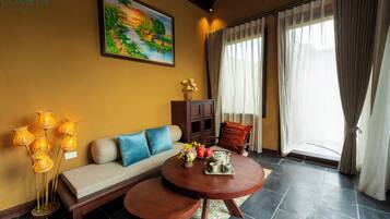 Luxury Villa, Garden View | Living area | 30-inch flat-screen TV with cable channels