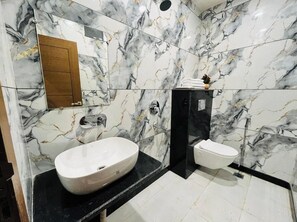 Shower, free toiletries, towels, soap