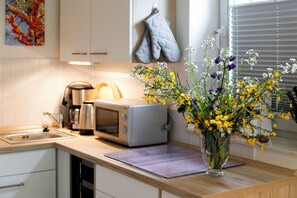 Fridge, microwave, dishwasher, coffee/tea maker