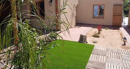 Rural apartment with garden and elevated swimming pool.