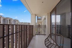 Standard Apartment, City View | Courtyard view - Serene 1 BR in Surf 2-Creek Beach Access (Dubai)