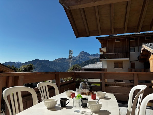 Outdoor dining - Village center apartment with pool and terrace (Notre-Dame-de-Bellecombe)