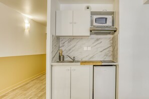 Mini-fridge, microwave, stovetop, espresso maker