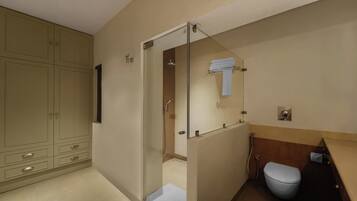 Une salle de bain moderne avec une douche à parois de verre, des toilettes et un meuble avec des tiroirs.