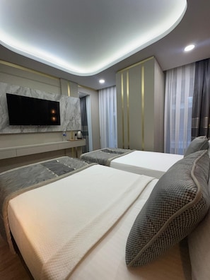 Standard Double Room, City View | In-room safe, iron/ironing board, free WiFi