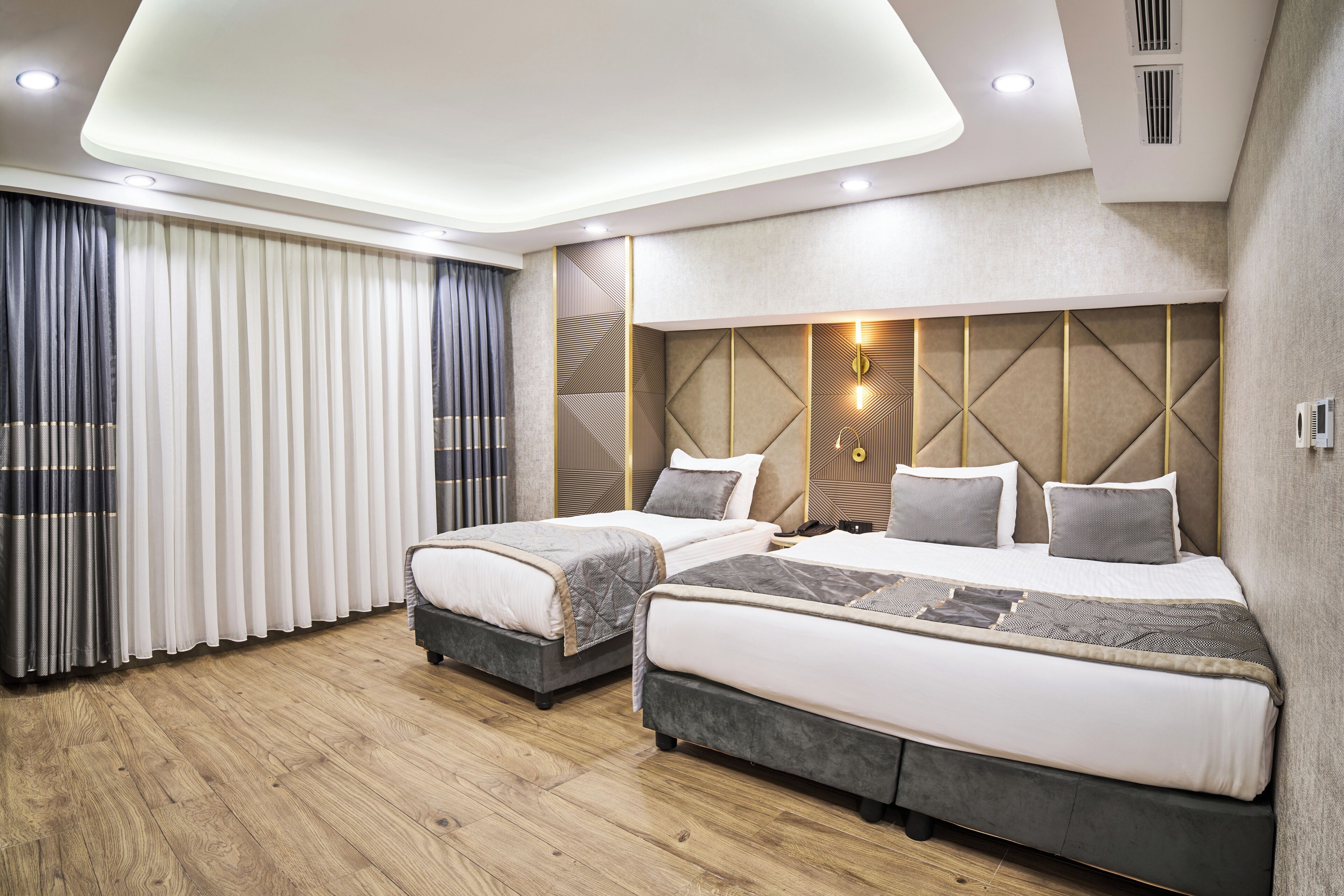 Economy Triple Room | Egyptian cotton sheets, premium bedding, memory foam beds, minibar