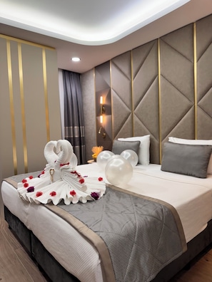 Coffres-forts dans les chambres, fer et planche à repasser