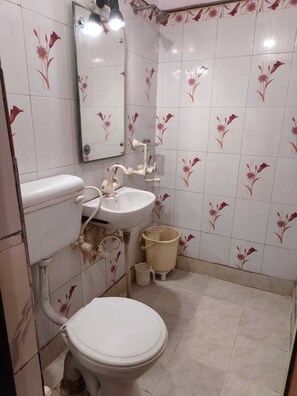 Toalhas de banho, sabonete, shampoo