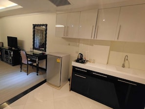 Suíte estúdio luxo, sacada, vista para o jardim | Cozinha privada