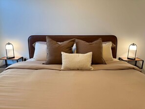 1 bedroom, desk, iron/ironing board, travel crib