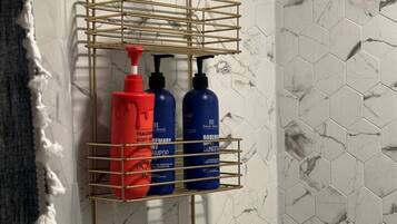 Hair dryer, towels, soap, toilet paper