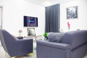 Apartamento superluxo, 1 quarto, sinalização e notificação para pessoas com deficiência visual | Área de estar