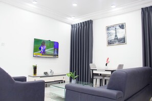 Apartamento superluxo, 1 quarto, sinalização e notificação para pessoas com deficiência visual | Área de estar