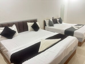 Deluxe vierpersoonskamer | Gratis wifi, beddengoed
