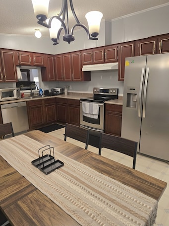 Fridge, microwave, oven, stovetop. Stay on an active 4th Generation Family Farm at a cozy home in Cameron, NC!