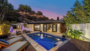 Outdoor pool, pool umbrellas, sun loungers