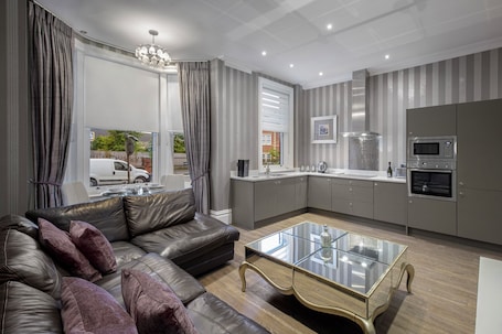 Luxury Apartment | Living area | Flat-screen TV