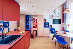 Fridge, microwave, stovetop, coffee/tea maker