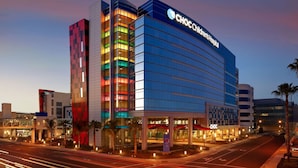 A modern hospital building with a prominent sign reading "CHOC Children’s Hospital."