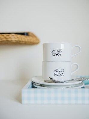 Deluxe Quadruple Room, City View | Coffee and/or coffee maker