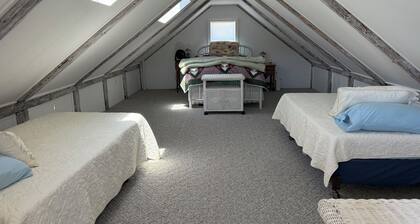 Historic waterfront cottage offers quiet, comfortable intimacy.