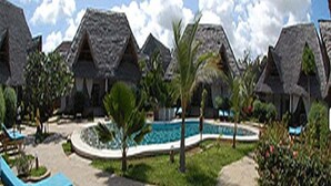 A resort with thatched-roof cottages, a swimming pool, and lounge chairs. - JOAHR VILLA  (Malindi)