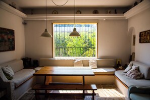 TV, fireplace - An art collector's family-friendly retreat Villa with Garden and Jacuzzi (Nea Makri)