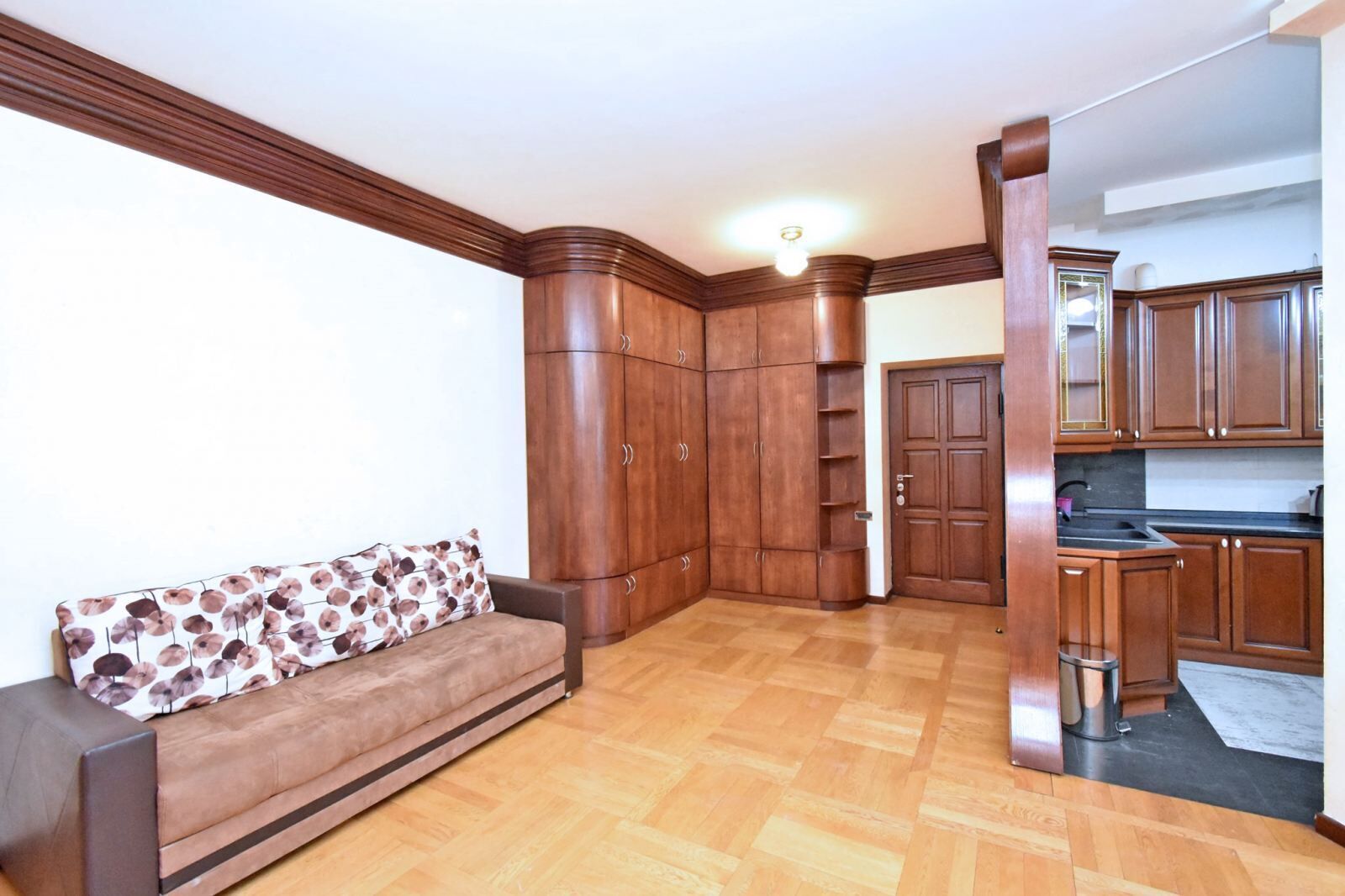 Standard Apartment | Living area | 59-inch flat-screen TV with cable channels