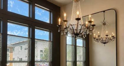 Walk to The Village from this stylish townhome featuring 3 private king suites, each with its own bathroom. Enjoy a fully stocked kitchen, cozy fireplace, fast Wi-Fi, and attached garage—the perfect home base for families, friends, or business travel