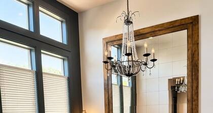 Walk to The Village from this stylish townhome featuring 3 private king suites, each with its own bathroom. Enjoy a fully stocked kitchen, cozy fireplace, fast Wi-Fi, and attached garage—the perfect home base for families, friends, or business travel