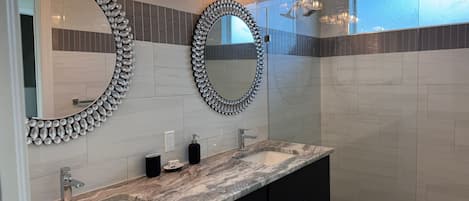 Shower, towels, soap, toilet paper