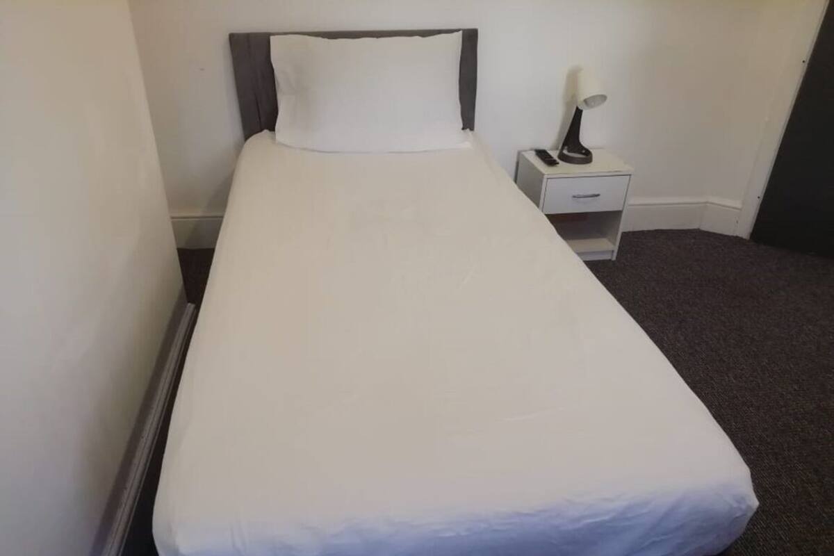 Basic Single Room, Non Smoking, Refrigerator | Desk, laptop workspace, blackout drapes, iron/ironing board