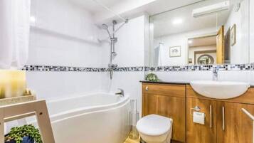 Hair dryer, towels, soap, toilet paper