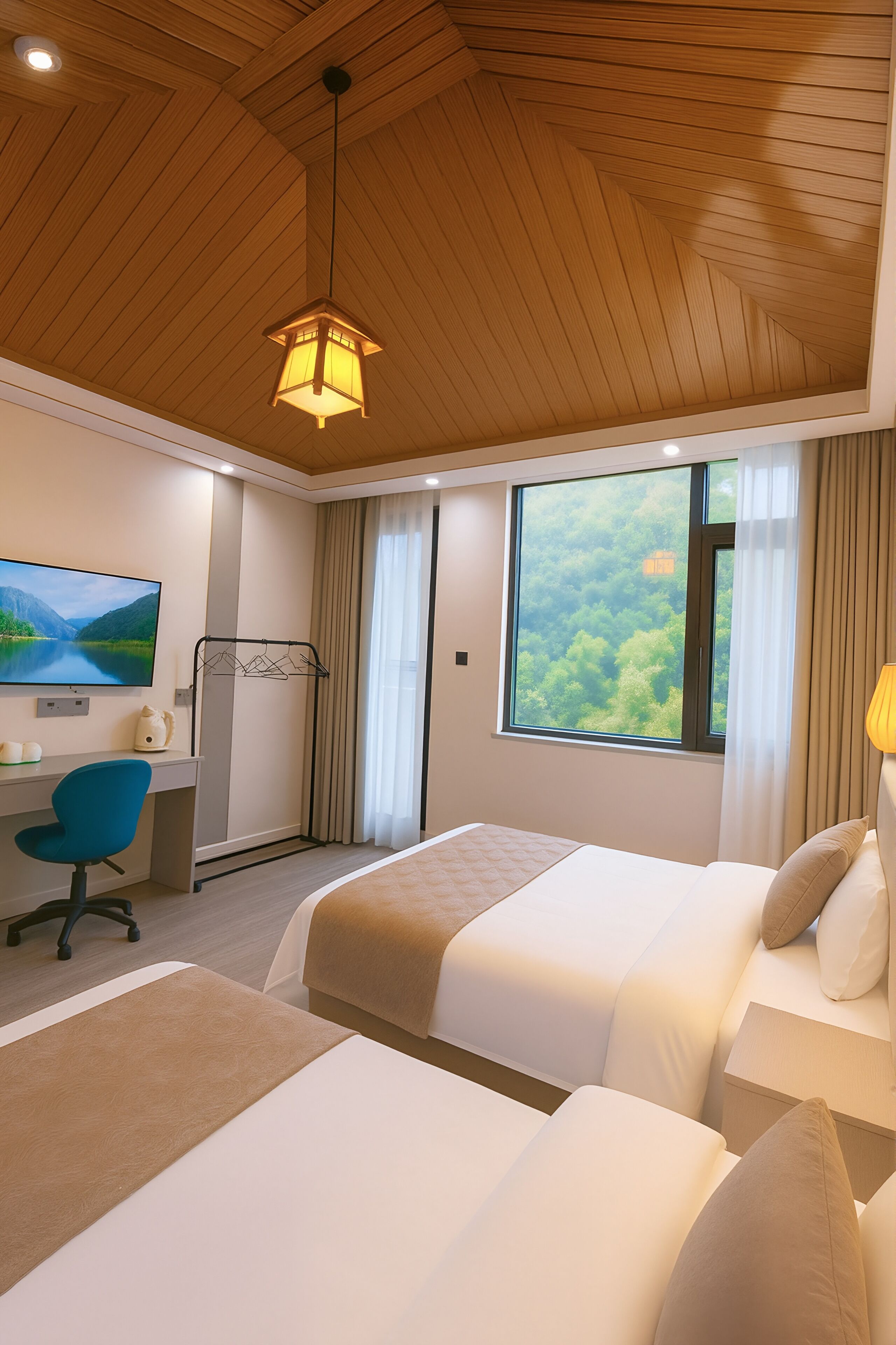 A hotel room with two beds, a desk with a chair, a TV, and a large window with a view of greenery.