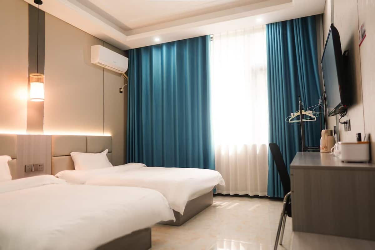 Premium bedding, down duvets, pillow-top beds, individually decorated