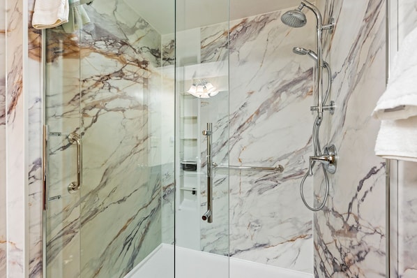 Shower, hair dryer, towels, soap