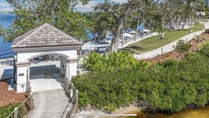 A beachside view with a gazebo, a pathway, and a view of the ocean. - Gated community condo with private island minutes to Fort Myers Beach or Sanibel (Fort Myers)