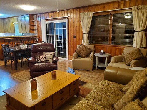 Large charming 4 bedroom, 3 bath on quiet wooded lot with lots of space for all!